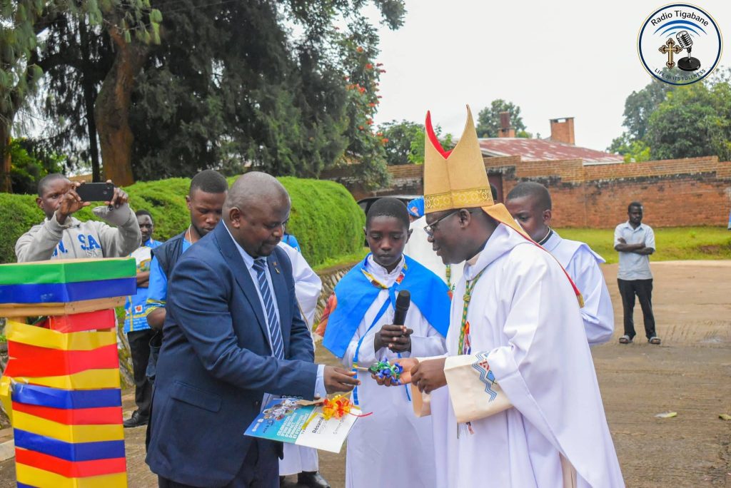 Bishop Nyirenda receiving the new vehicles Keys